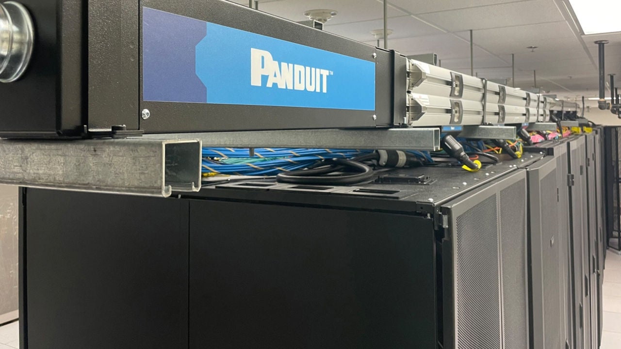 Long row view of the Overhead Power Distribution inside UI Health’s Data Center