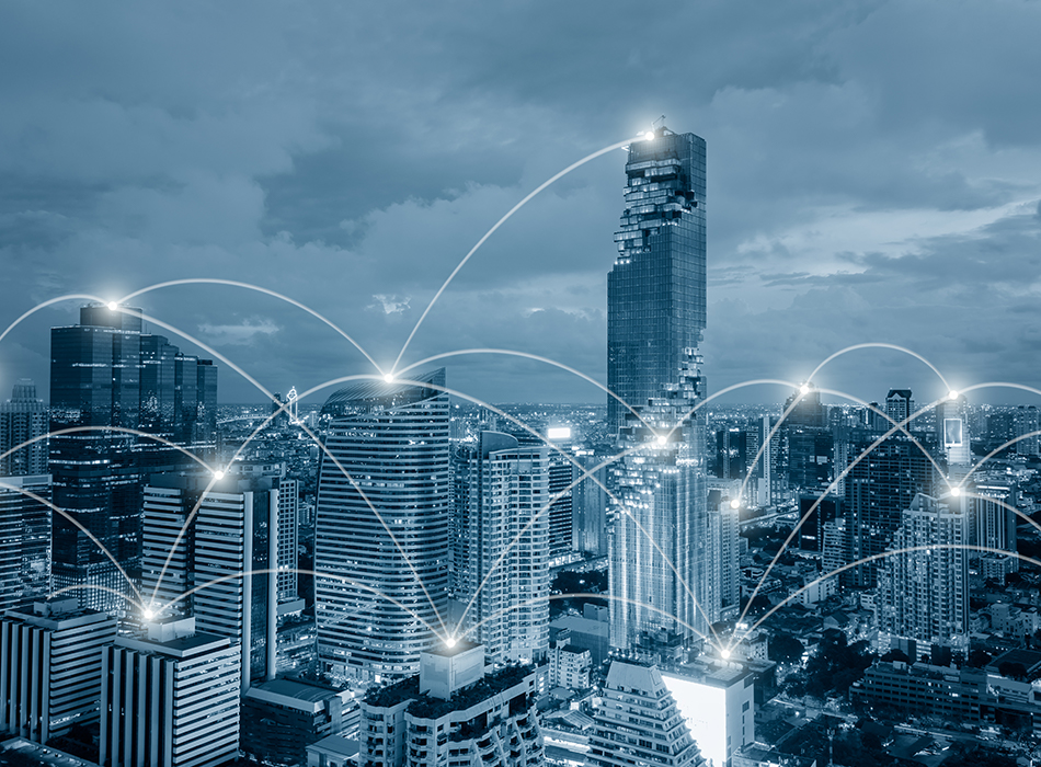 City skyline with skyscrapers connected by white lines to represent connectivity hardware