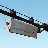 Fiber splice closure hanging from an aerial utility line