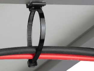 Black and red nylon cables held by a black cable tie