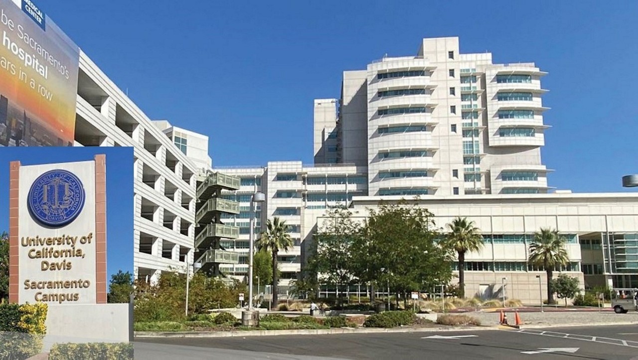 UC Davis Medical Center Building with Palm Trees and Signage